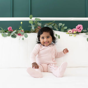 Kyte Baby Ribbed Ruffle Zippered Footie / Blush