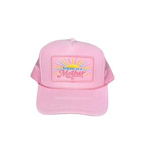 Pink trucker hat with 'Strong as a Mother' text on a gray background