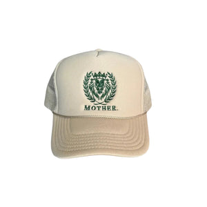 Beige trucker cap with green logo and text on a light gray background