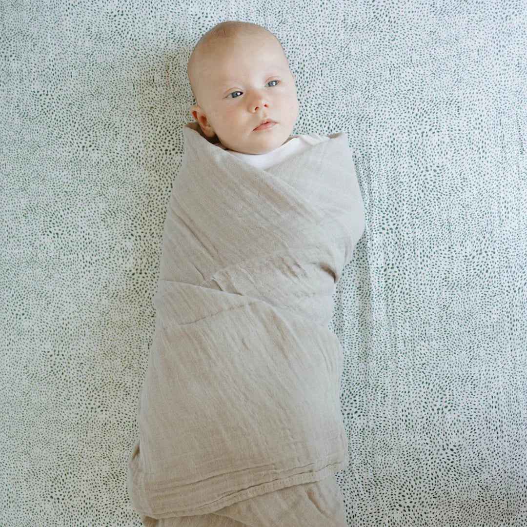 Little Unicorn Cotton Muslin Crib Sheet / Green Seed