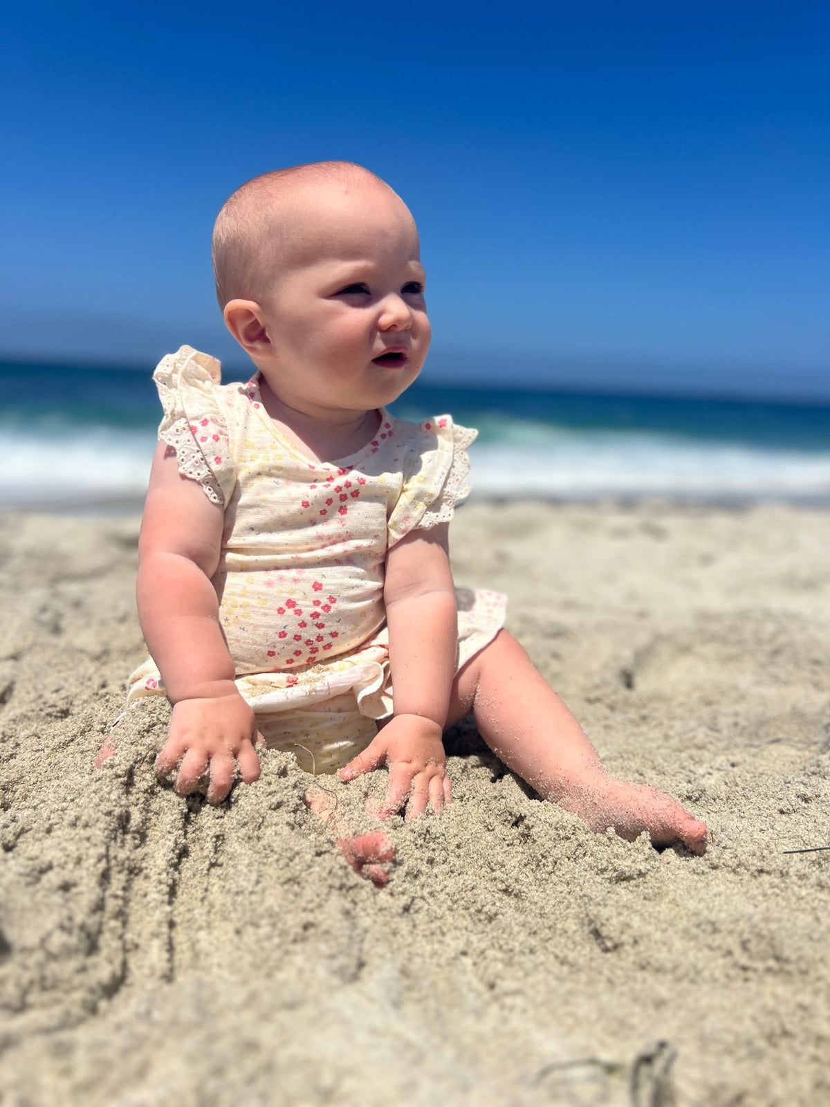 Pink Spring Floral Amber Flutter Sleeve Onesie