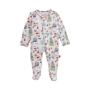 Baby footie featuring magnetic closure with colorful pattern on a white background