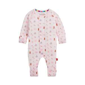 Baby convertible footie with magnetic closure with nursery nostalgia pattern on a pink background