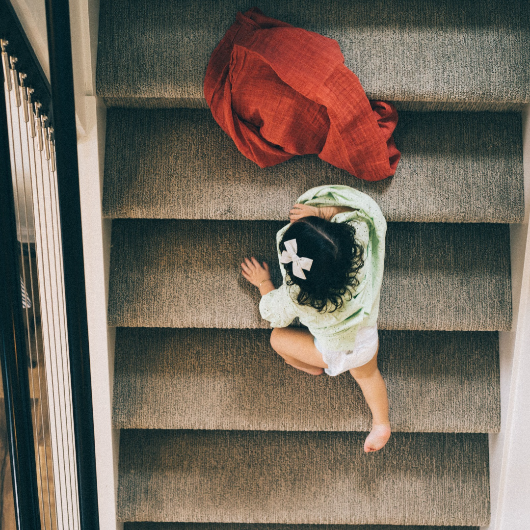 Little Unicorn Cotton Muslin Swaddle / Rust