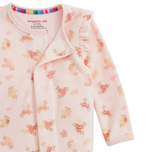 close up magnetic closure on floral baby footie