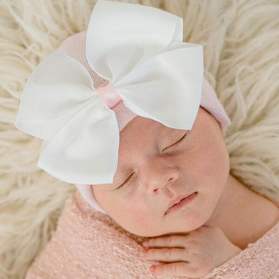 IlyBean Nursery Beanie / Solid Pink With Big White Bow